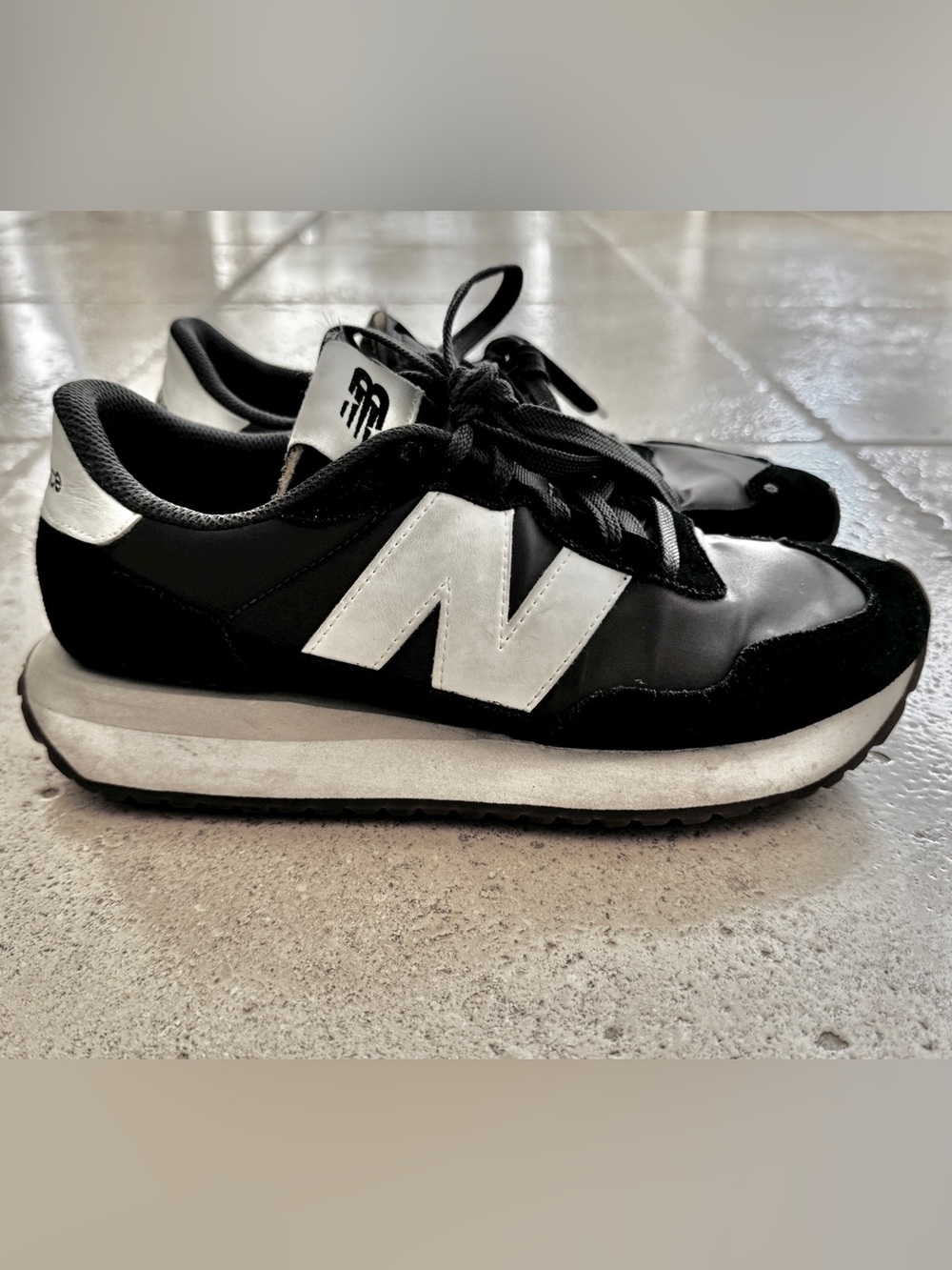 New Balance Black and White Low-Profile Women’s Sneakers